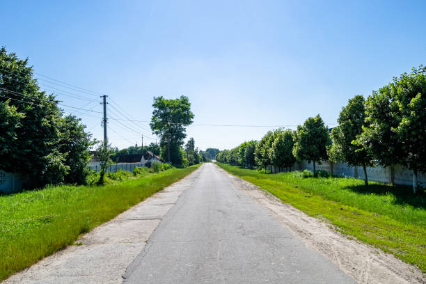 istock Beautiful empty asphalt road in countryside on colored background 1454132316