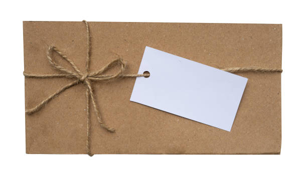 istock Old brown gift box with rope bow and card for mockups. Retro package for celebration design element 1454135154