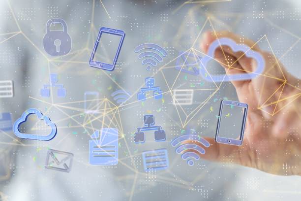 istock Hand zooming at blue digital symbols - electronic devise icons 1454135206