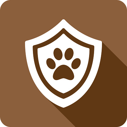 Vector illustration of a shield with paw print icon against a brown background in flat style.