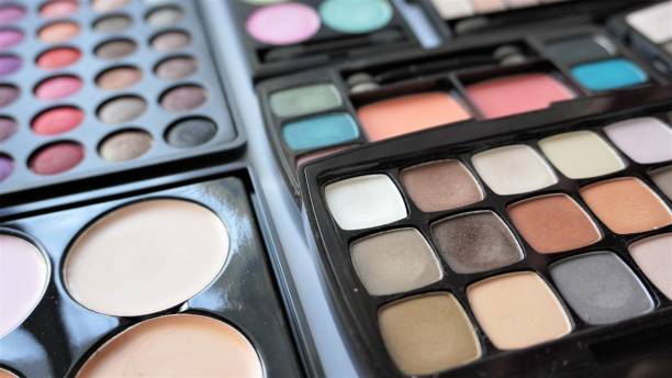 istock Makeup and beauty set kits - colorful eyeshadow palettes and highlighters 1454136076