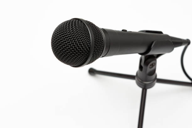 istock microphone and antique telephone 1454136394