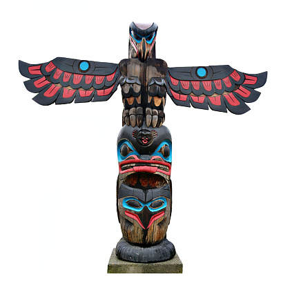 Totem pole in Duncan BC relating local legend called the Feast.