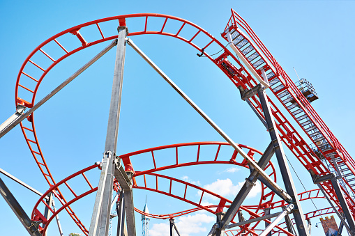 Roller coaster on blue sky