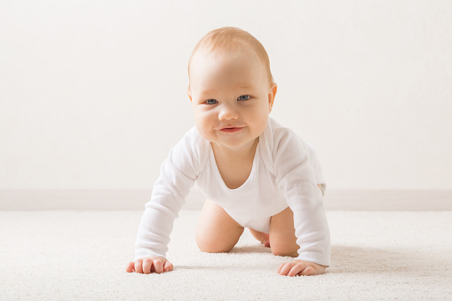 Portrait of a Crawling Baby Girl