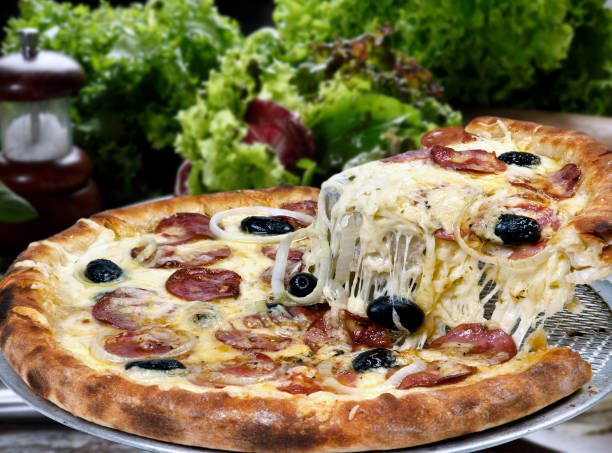 istock Pepperoni pizza with slices of onions 1454147672