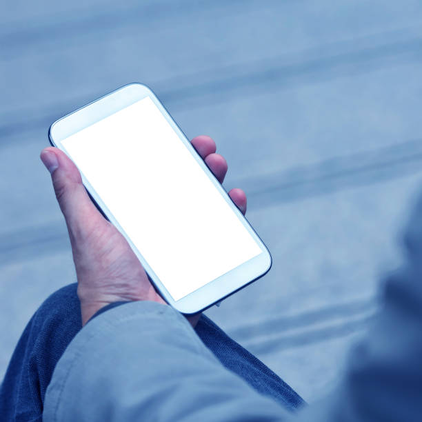 istock Business man with graph business on smartphone. 1454148543