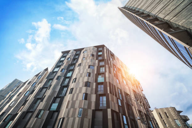 istock Apartment building with windows in modern architecture 1454150298