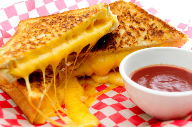 istock decadent grilled cheese sandwiches with oozing cheese running ou 1454152801