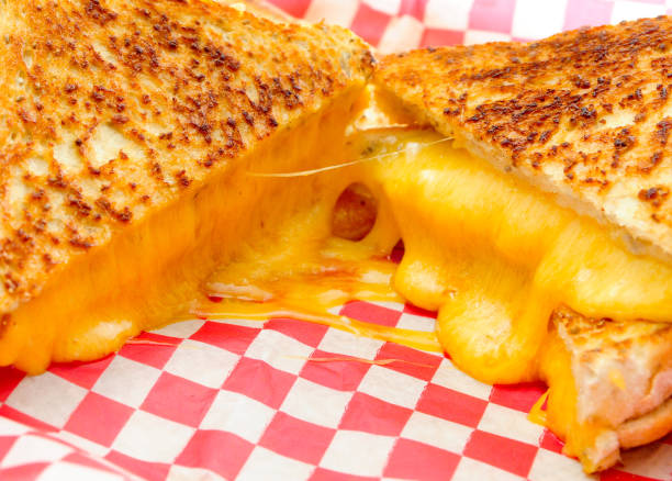 istock decadent grilled cheese sandwiches with oozing cheese running ou 1454152802