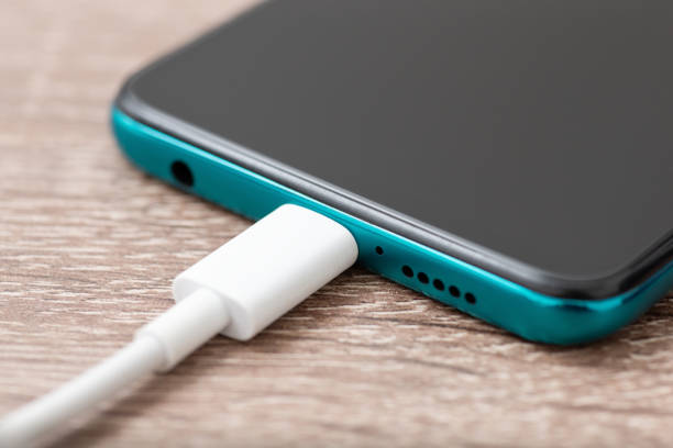 istock White cable connected to the phone 1454153204