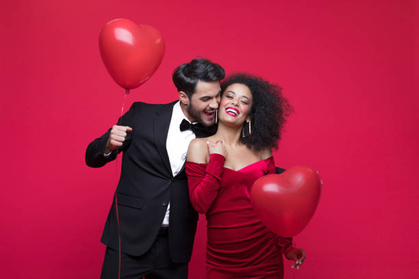 istock Beautiful couple celebrating Valentine's Day 1454153967