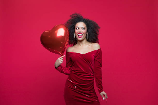 istock Beautiful woman celebrating Valentine's Day 1454154381