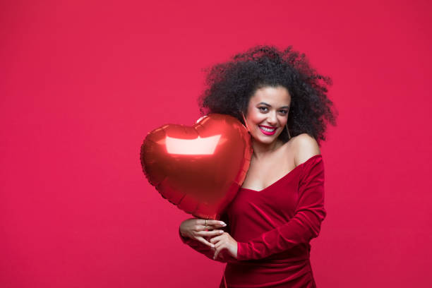 istock Beautiful woman celebrating Valentine's Day 1454154536