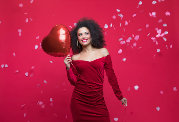 istock Beautiful woman celebrating Valentine's Day 1454154567