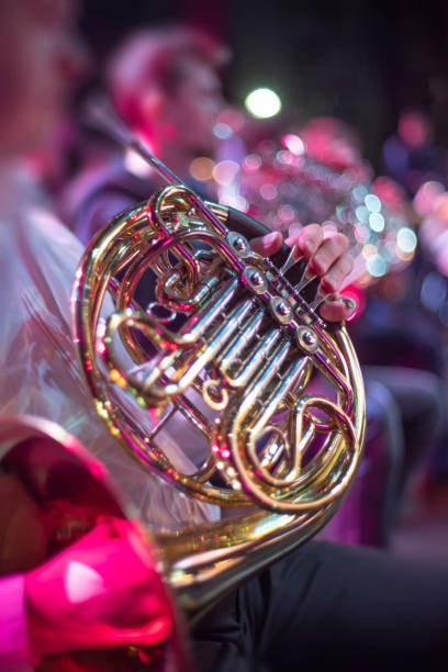 istock musician playing the horn 1454156088