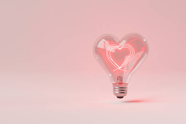 istock 3D rendering of heart shaped bulb with neon pink light 1454156346