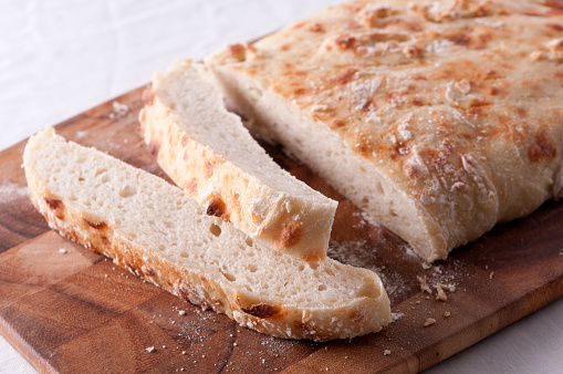 Bread crumbs in the toaster, around the bread