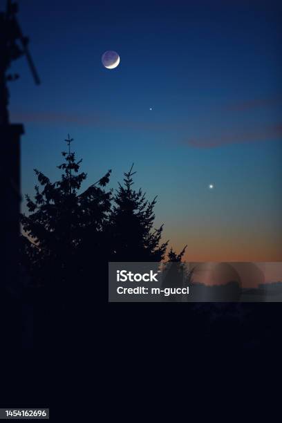 Moon With Planet Conjunction On Evening Urban Sky Stock Photo - Download Image Now - Venus - Planet, Moon, Jupiter - Planet