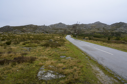 A road leading to the Serra da Freita mountain range in Portugal on a cloudy day