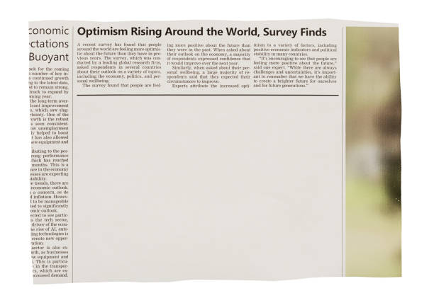 istock Newspaper cutting featuring optimistic economic articles with blank space for your copy 1454167409