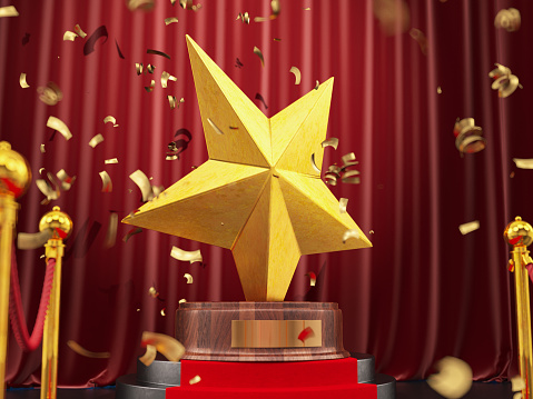 Cinema Movie or Theathre Awards Concept with a Star Shaped Trophy on a Podium with Red Carpet and Confetti. 3D Render