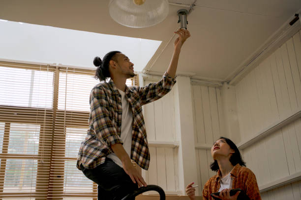 istock Young couple is renovate their house. 1454176776