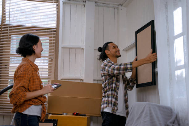 istock Young couple is renovate their house. 1454176784