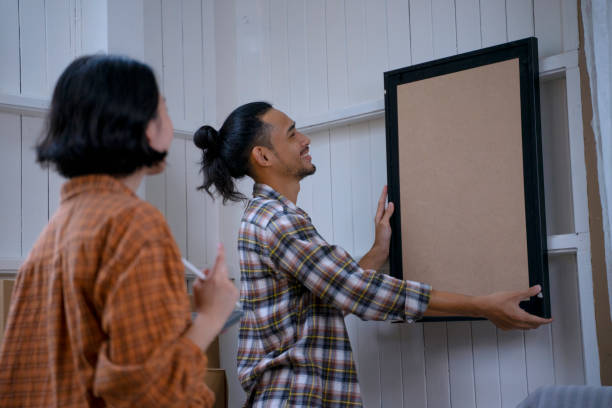 istock Young couple is renovate their house. 1454176786