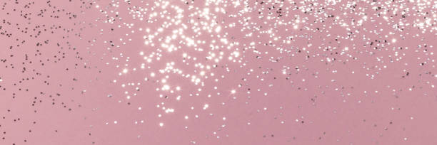 istock Sparkling silver glitter on pink background banner 1454179436