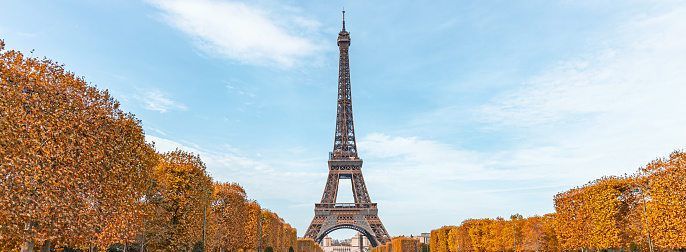 Eiffel Tower and Champ de Mars park on an autumn day in Paris, France