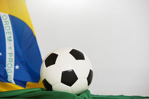 Celebrating Brazilian football, a black-and-white soccer ball with the national flag of Brazil.