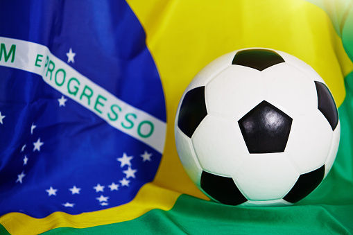 Celebrating Brazilian football, a black-and-white soccer ball with the national flag of Brazil.