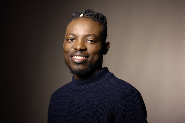istock Portrait of confident young African man 1454185437