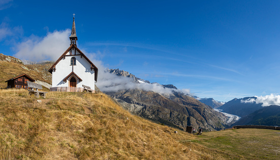 Idyllic St Coloman Church in Allgau, Bavarian Alps at summer, Germany.
