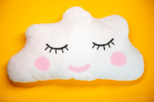 Sweet dreams cloud Child pillow on yellow background