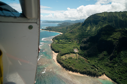 Open Door Helicopter Tour of Na Pali Coast on Kauai, Hawaii. High quality photo. View of Wainiha, Kauai from a heli.