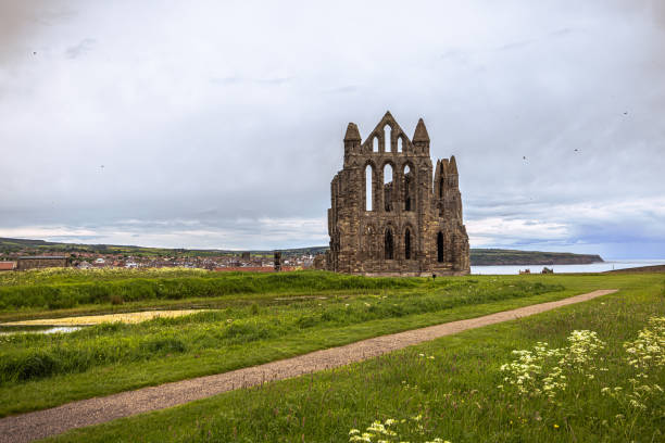 istock Whitby - May 23 2022: Gothic Abbey of Whitby, England. 1454203649