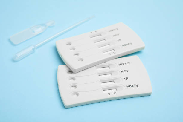 istock Disposable express test kit for hepatitis on light blue background 1454205422