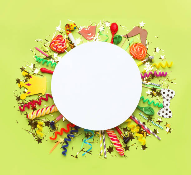 istock Frame of festive items on light green background, flat lay with space for text. Surprise party concept 1454205621