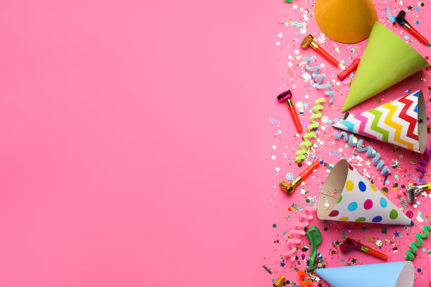 istock Beautiful flat lay composition with festive items on pink background, space for text. Surprise party concept 1454206569