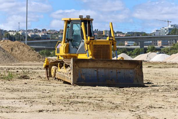istock Crawler bulldozer tractor on the muddy ground 1454211424