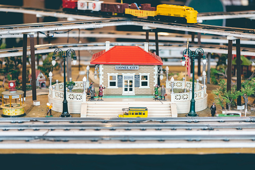 Detroit, United States – April 01, 2021: A colorful toy train city model with small figures and details