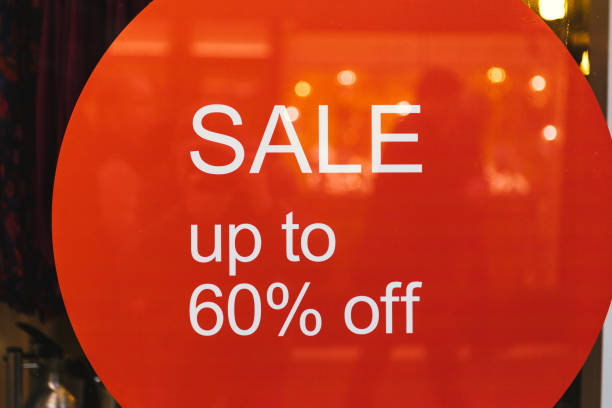istock Sale sign in store window 1454213257