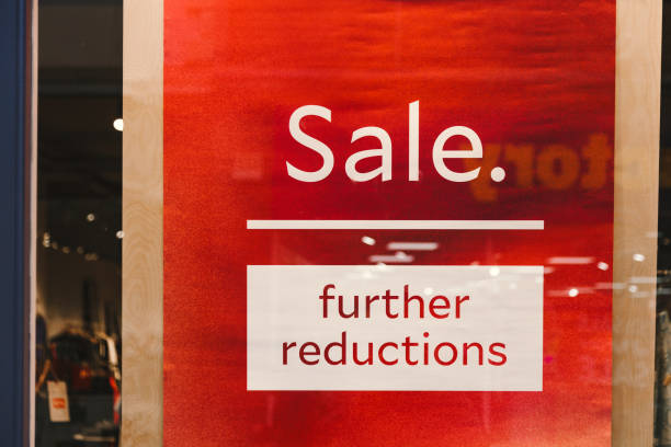 istock Sale sign in store window 1454213277