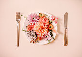Plate with fresh flowers