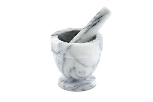 A Mortar and pestle in white and grey marble