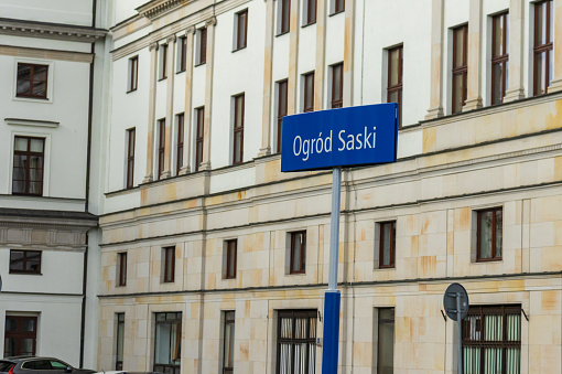 Warsaw, Poland - October 2, 2022: Ogrod Saski street sign in Warsaw. Architecture detail. Ogrod Saski.