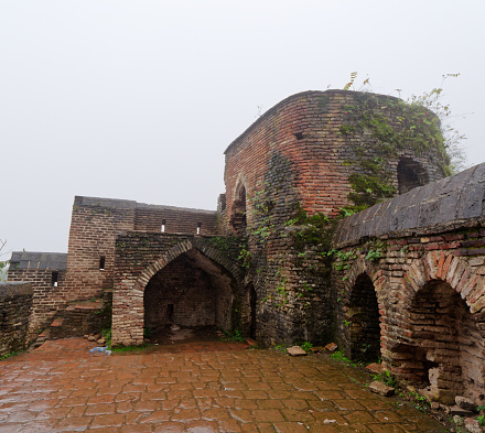 View of the Rudkhan Castle on a misty rainy day, Gilan province, Iran