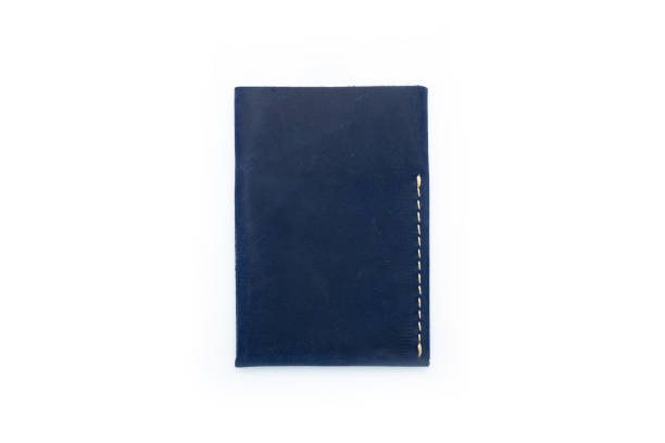 istock Blue leather wallet on a button on a white background. Card holder. Top view 1454228972
